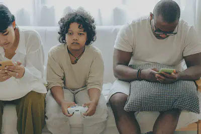 Photo by Ketut Subiyanto on [Pexels](https://www.pexels.com/photo/multiethnic-family-spending-time-together-on-couch-with-gadgets-4545968/).